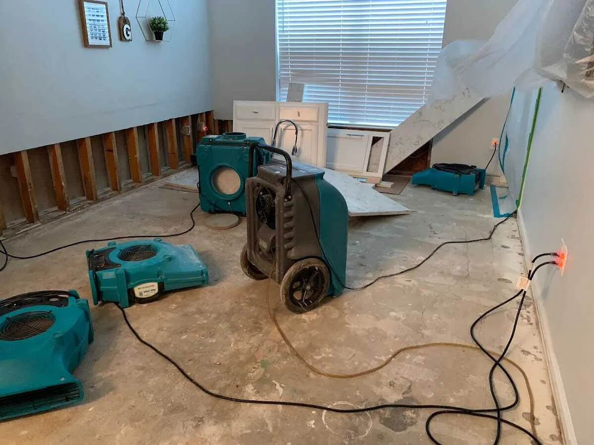 Dehumidifier in flood-cut room for Water Damage Restoration in Youngstown